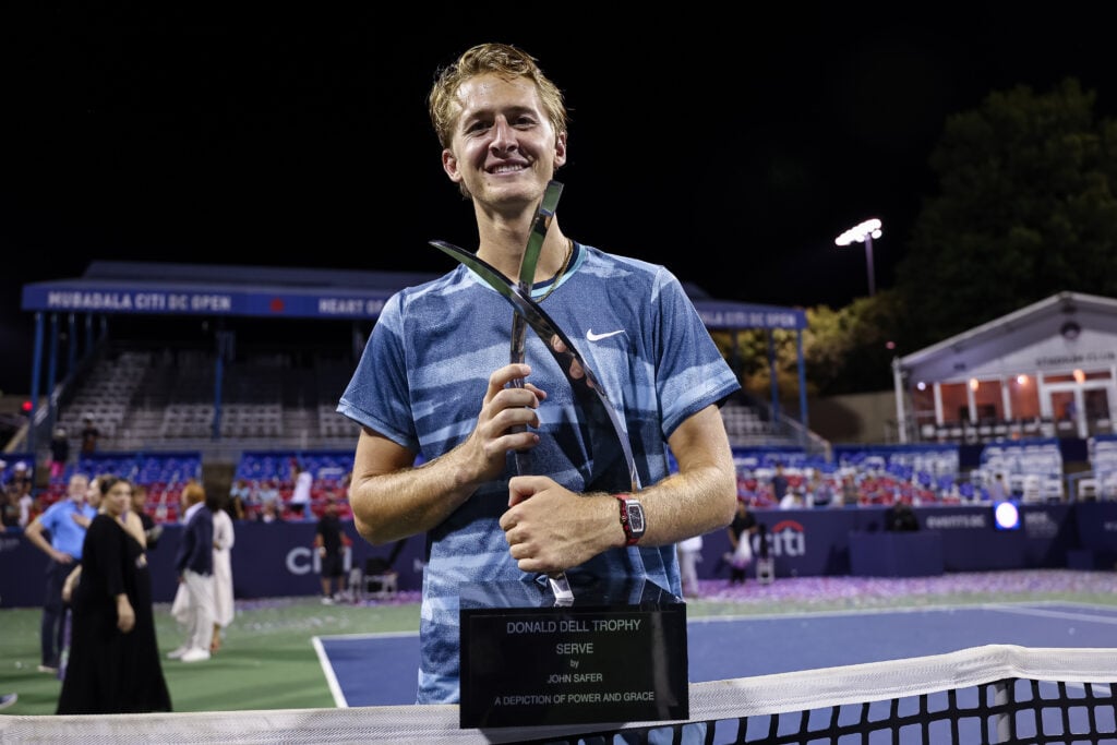 Sebastian Korda of the United States holds the Donald Dell Trophy after defeating Flavio Cobolli of Italy to win the mens singles finals match on the final day of the Mubadala Citi DC Open 2024 at William H.G. FitzGerald Tennis Center on August 4, 2024 in Washington, DC.