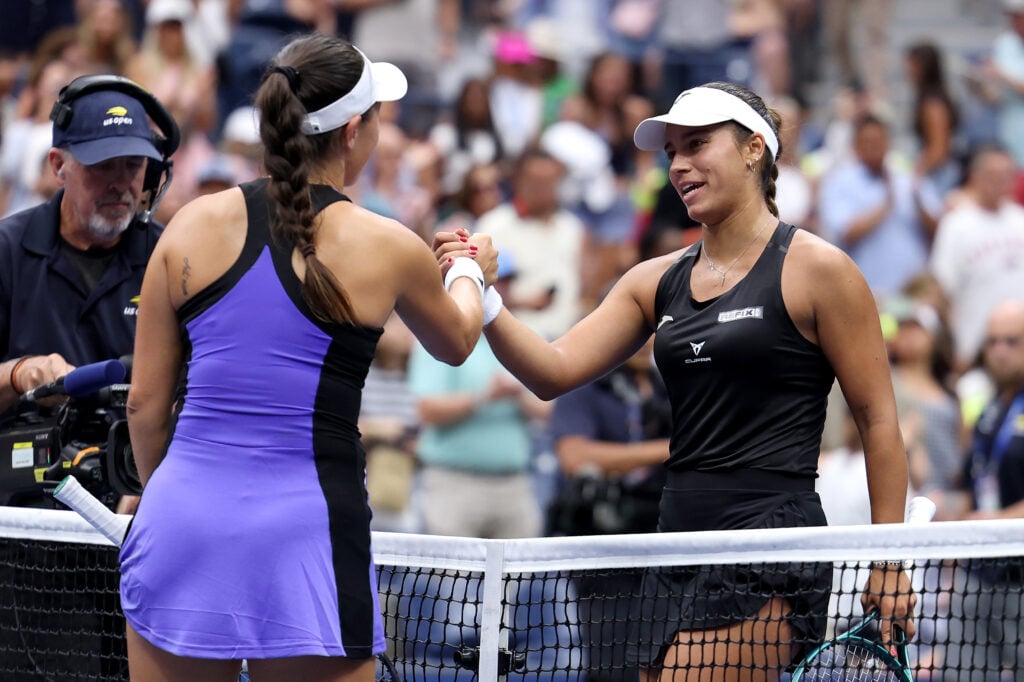Jessica Bouzas Maneiro of Spain shakes hands at the net after a loss against Jessica Pegula of the United States during their Women's Singles Third Round match on Day Six of the 2024 US Open at USTA Billie Jean King National Tennis Center on August 31, 2024 in the Flushing neighborhood of the Queens borough of New York City.