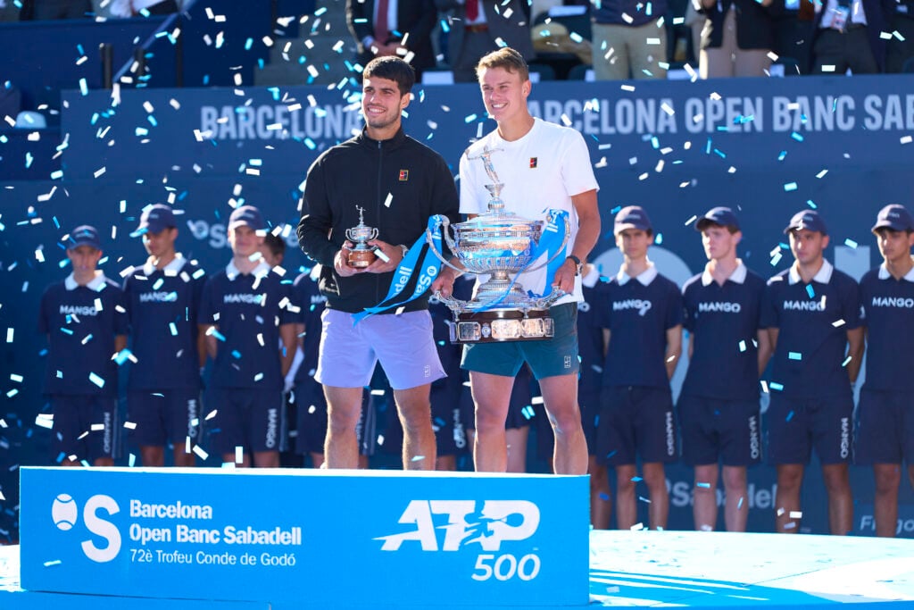 Holger Rune and Carlos Alcaraz pictured after the 2025 Barcelona Open final.
