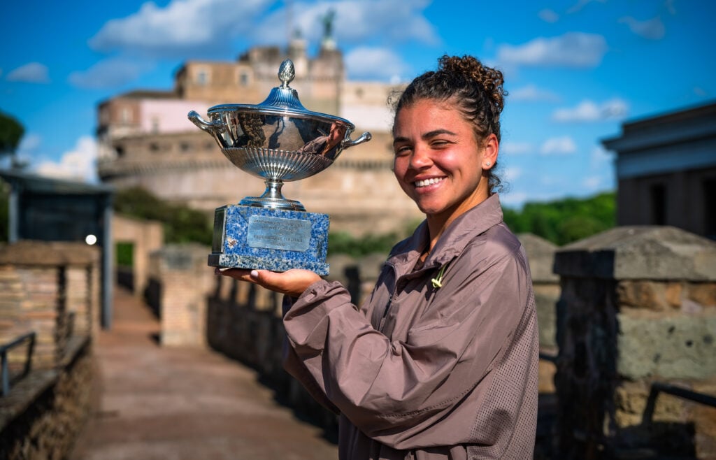 Jasmine Paolini of Italy poses with the champions trophy during the champions photo shoot after defeating Coco Gauff of the United States in the singles final on Day Fourteen of the Internazionali BNL D'Italia at Foro Italico on May 18, 2025 in Rome, Italy