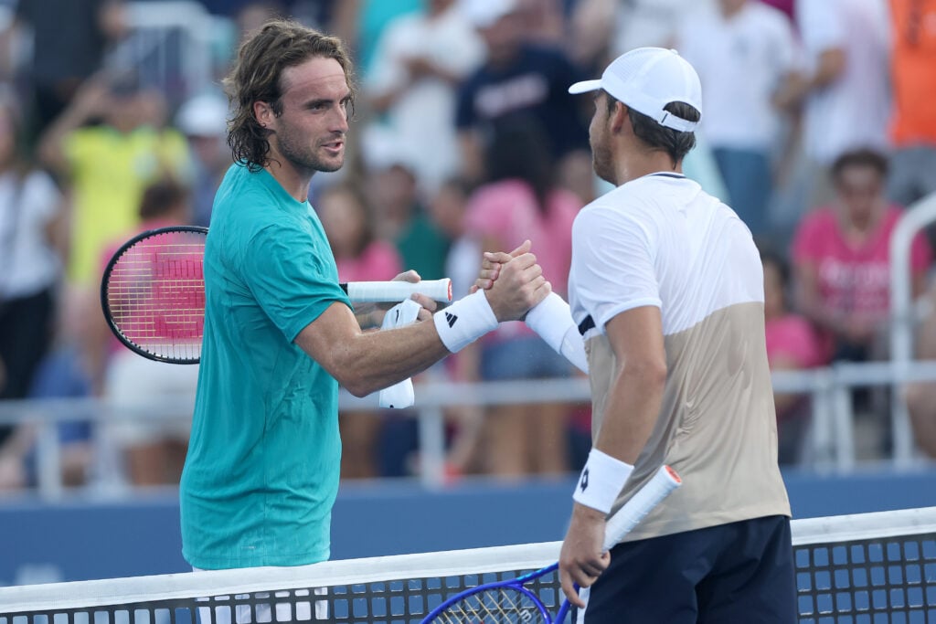 Stefanos Tsitsipas of Greece congratulates Benjamin Bonzi of France after their match during the Cincinnati Open at Lindner Family Tennis Center on August 11, 2025 in Mason, Ohio.