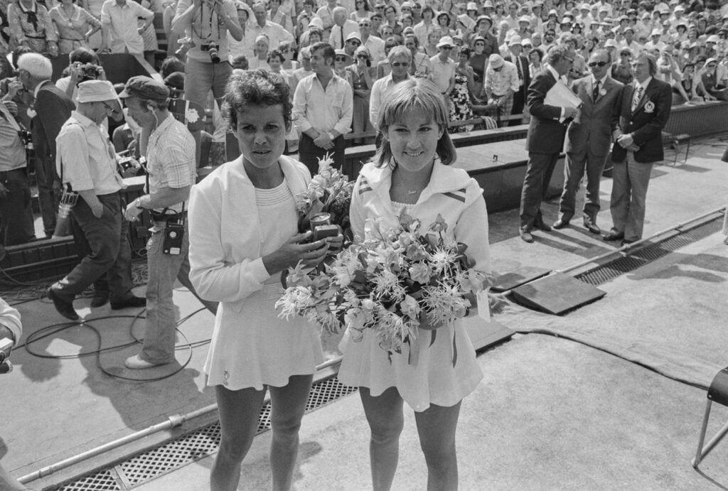 Australian tennis player Evonne Goolagong Cawley and American tennis player Chris Evert after their women's singles final at the Wimbledon Championships, at the All England Lawn Tennis and Croquet Club in Wimbledon, London, England, 3rd July 1976. Evert won the game 6-3, 4-6, 8-6.