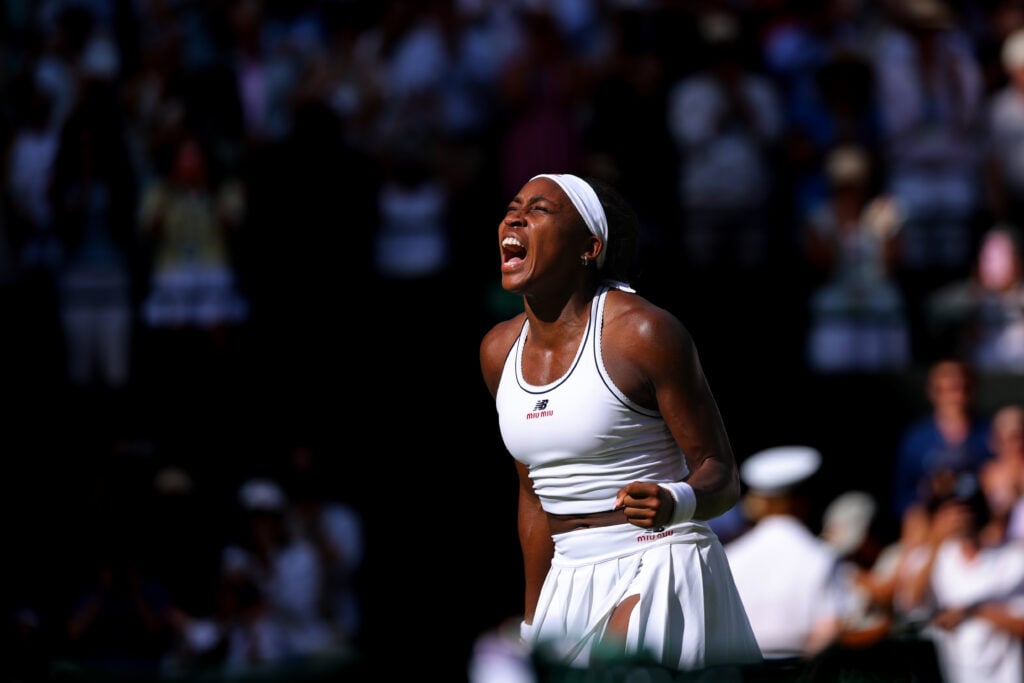 Coco Gauff celebrates after winning her second-round match at Wimbledon.