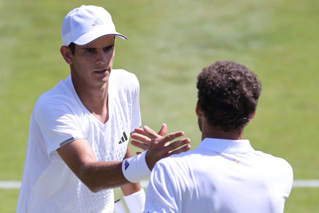Spain's Rafael Jodar shakes hands with Spain's Pablo Carreno Busta after beating him during their men's singles second round tennis match on the fourth day of the 2026 Wimbledon Championships at The All England Lawn Tennis and Croquet Club in Wimbledon, southwest London, on July 2, 2026.