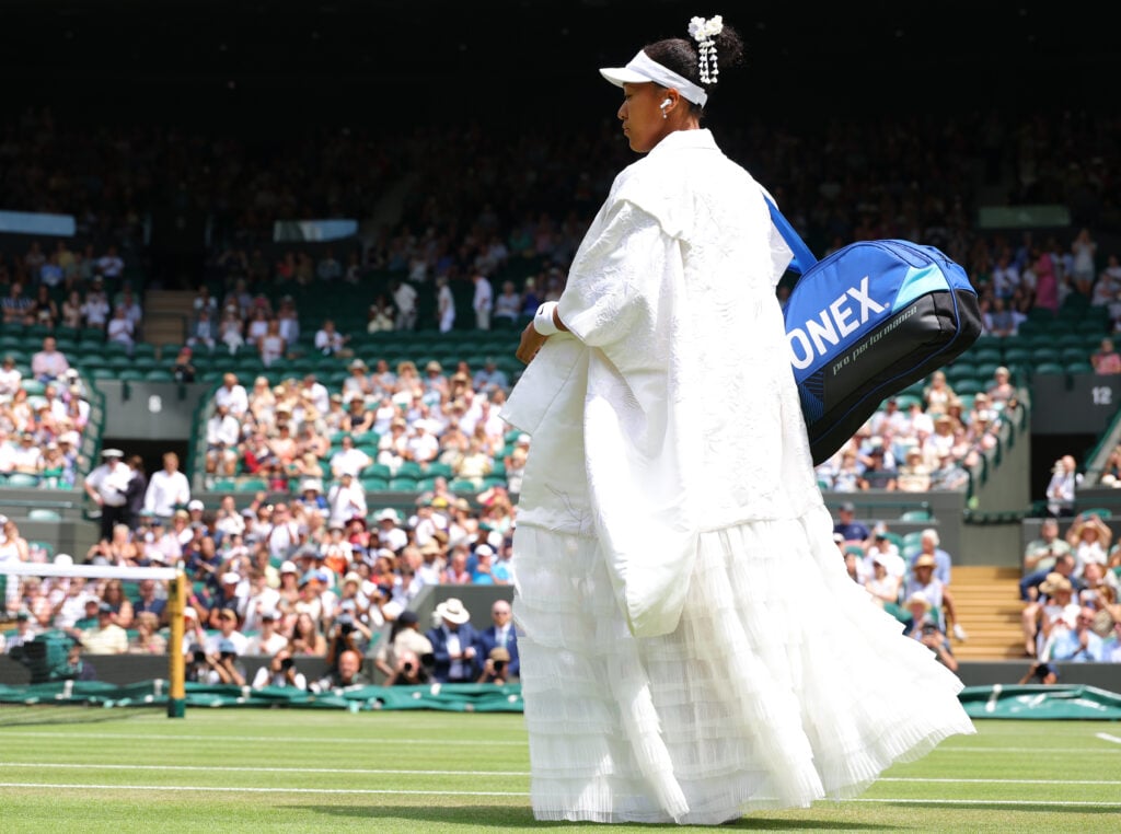 Naomi Osaka (JPN) walks out on court in kimono dress on day five of The Championships Wimbledon 2026 at All England Lawn Tennis and Croquet Club on July 3, 2026 in London, England.