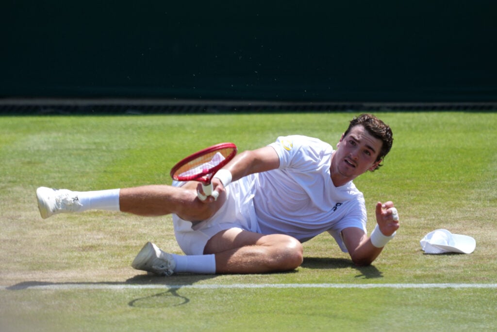 Joao Fonseca in action during his match against Roman Safiullin at Wimbledon in 2026.