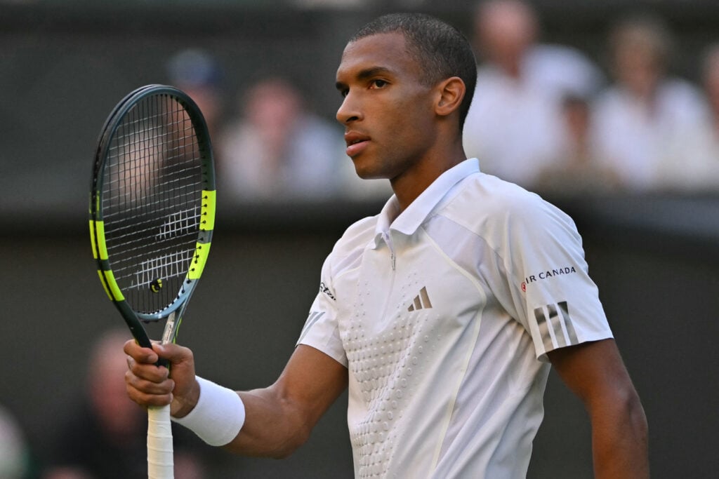 Felix Auger-Aliassime reacts during his match against Michael Zheng at Wimbledon in 2026.