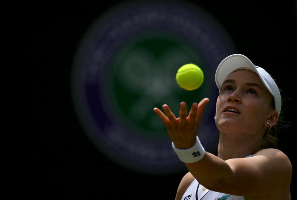 Kazakhstan's Elena Rybakina serves to Belgium's Elise Mertens during their women's singles third round tennis match on the sixth day of the 2026 Wimbledon Championships at The All England Lawn Tennis and Croquet Club in Wimbledon, southwest London, on July 4, 2026.