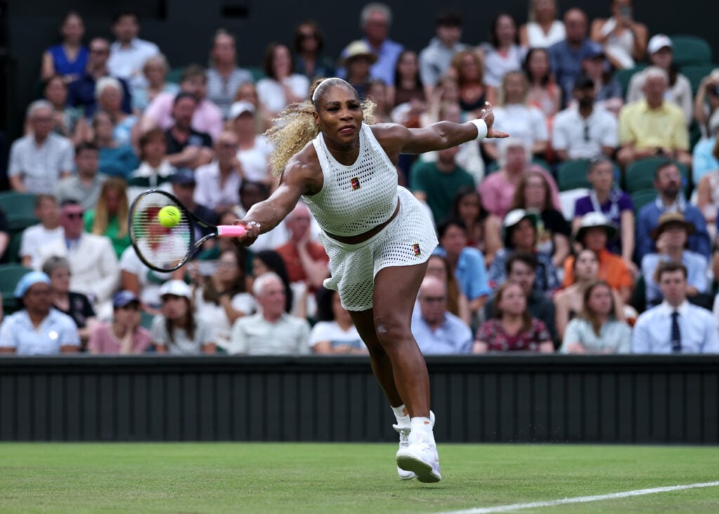 Serena Williams of United States plays a forehand against Maya Joint of Australia during their Ladies' Singles first round match on day two of The Championships Wimbledon 2026 at All England Lawn Tennis and Croquet Club on June 30, 2026 in London, England.