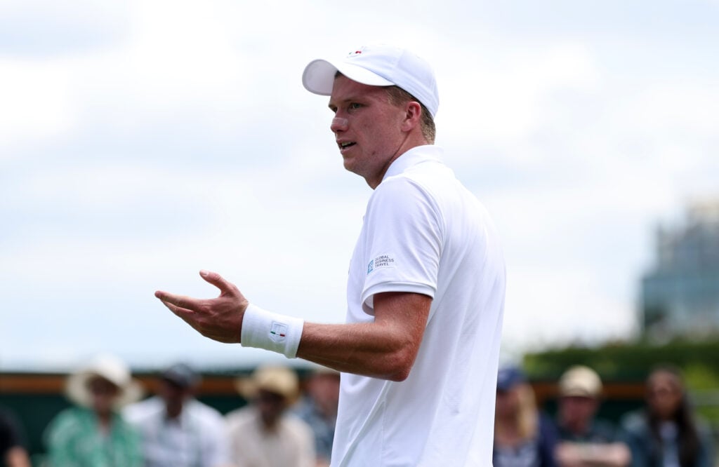 Jenson Brooksby in action at Wimbledon in 2026.