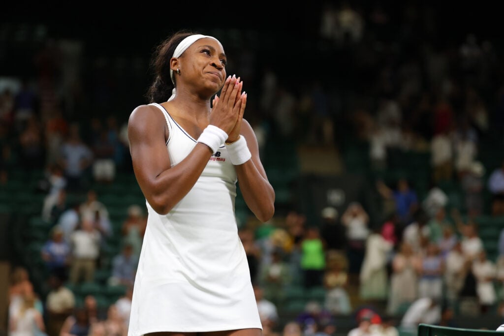 Coco Gauff puts her hands together in thanks