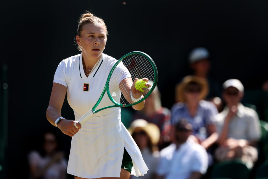 Amanda Anisimova of United States serves against Sofia Kenin of United States during their Ladies' Singles second round match on day four of The Championships Wimbledon 2026 at All England Lawn Tennis and Croquet Club on July 02, 2026 in London, England.