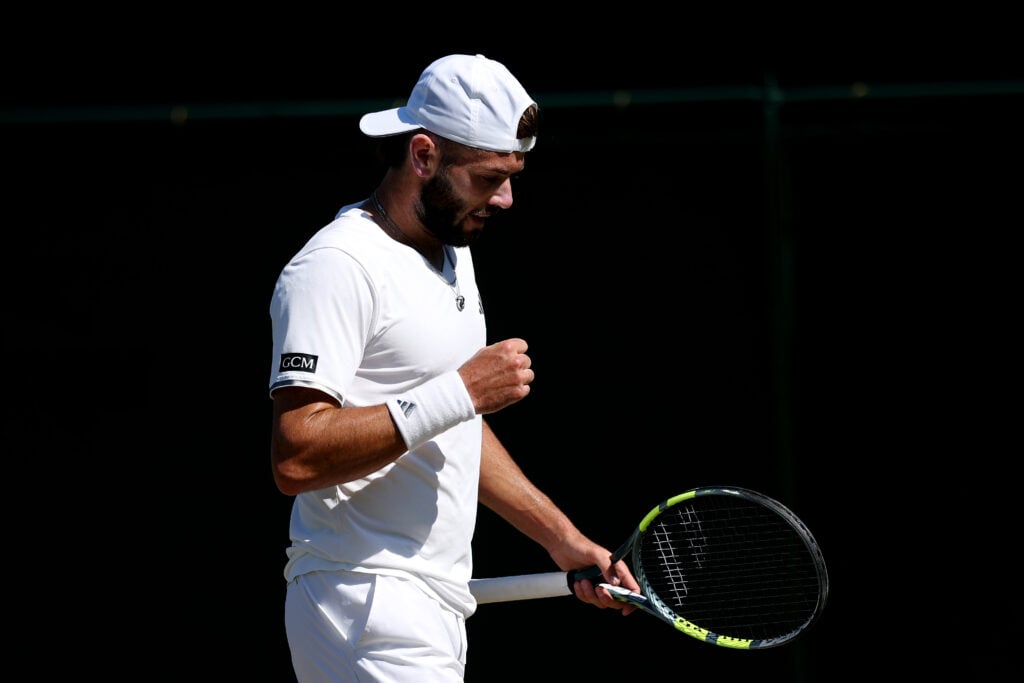 Jacob Fearnley of Great Britain celebrates a point against Jaume Munar of Spain during their Gentlemen's Singles second round match on day four of The Championships Wimbledon 2026 at All England Lawn Tennis and Croquet Club on July 02, 2026 in London, England.