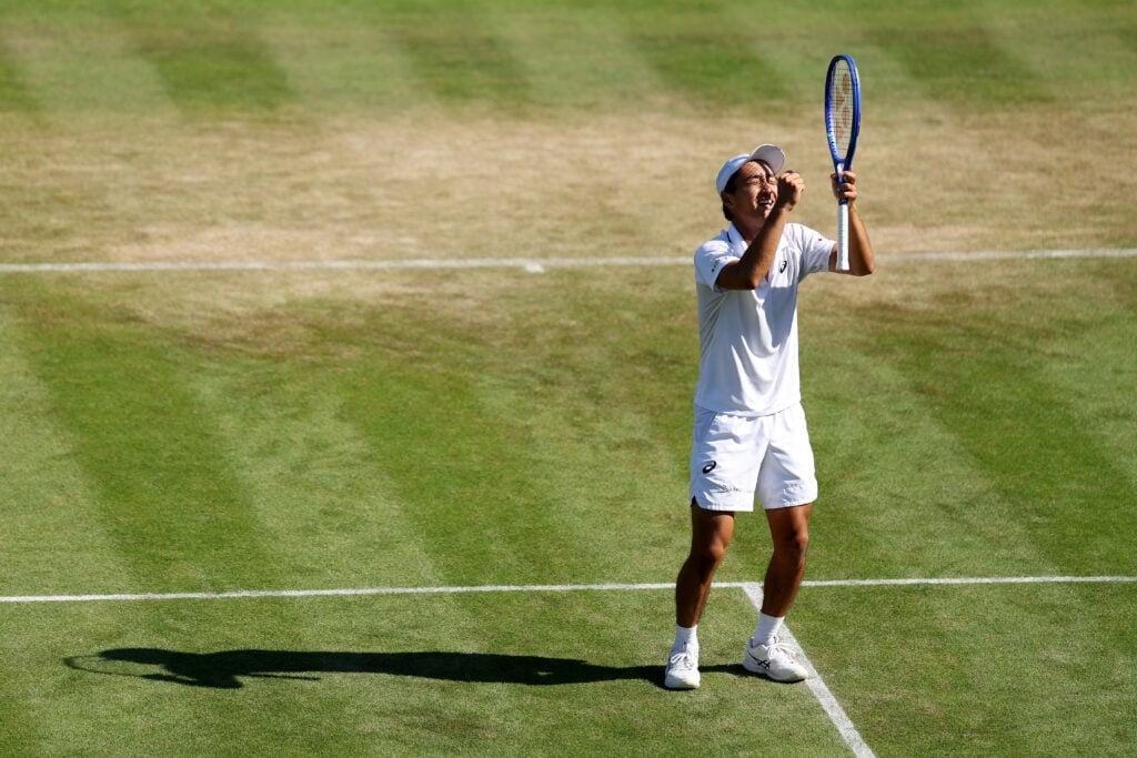 Shintaro Mochizuki celebrates reaching the fourth round of Wimbledon.