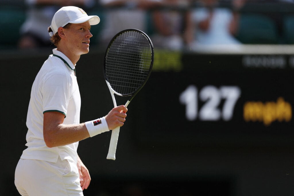 Italy's Jannik Sinner reacts to beating Germany's Jan-Lennard Struff during their men's singles quarter-final tennis match on the ninth day of the 2026 Wimbledon Championships at The All England Lawn Tennis and Croquet Club in Wimbledon, southwest London, on July 7, 2026.