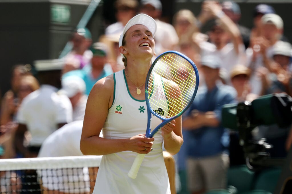 Elise Mertens celebrates after beating Elena Rybakina at Wimbledon.