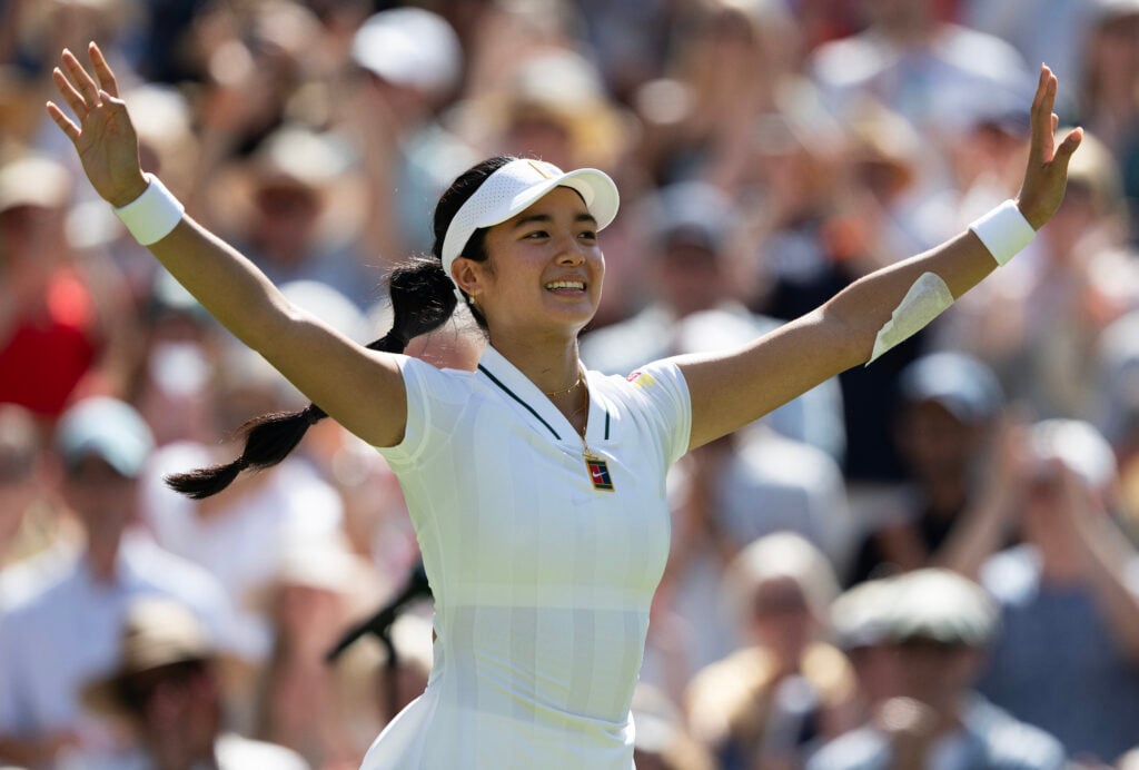 Alex Eala reacts after beating Iga Swiatek at Wimbledon.