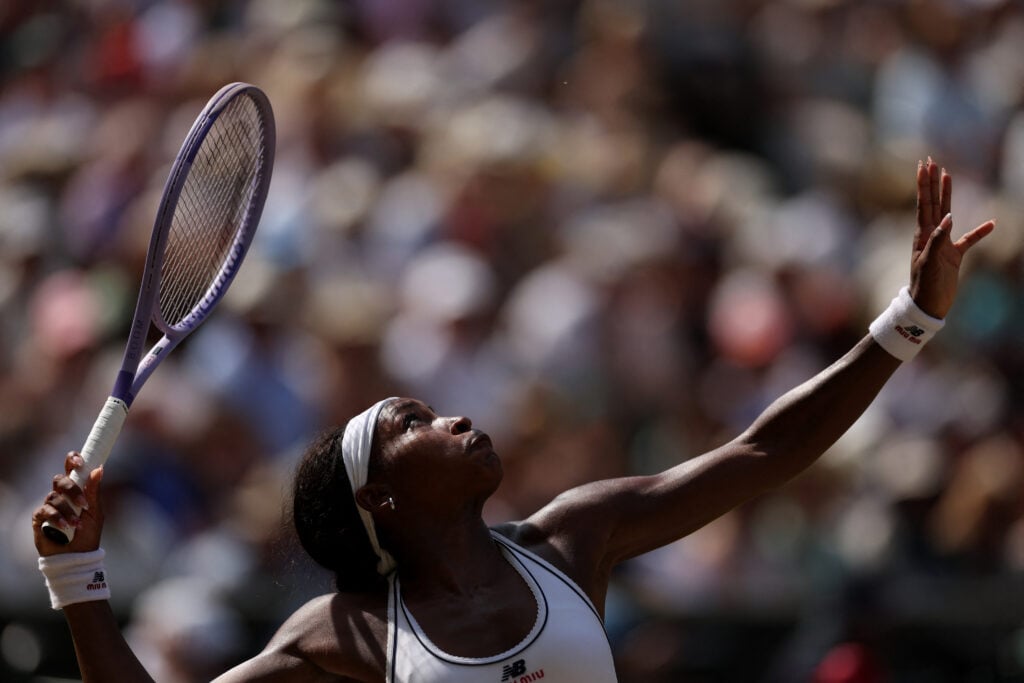 US player Coco Gauff serves to Czech Republic's Karolina Muchova during their women's singles semi-final tennis match on the eleventh day of the 2026 Wimbledon Championships at The All England Lawn Tennis and Croquet Club in Wimbledon, southwest London, on July 9, 2026.