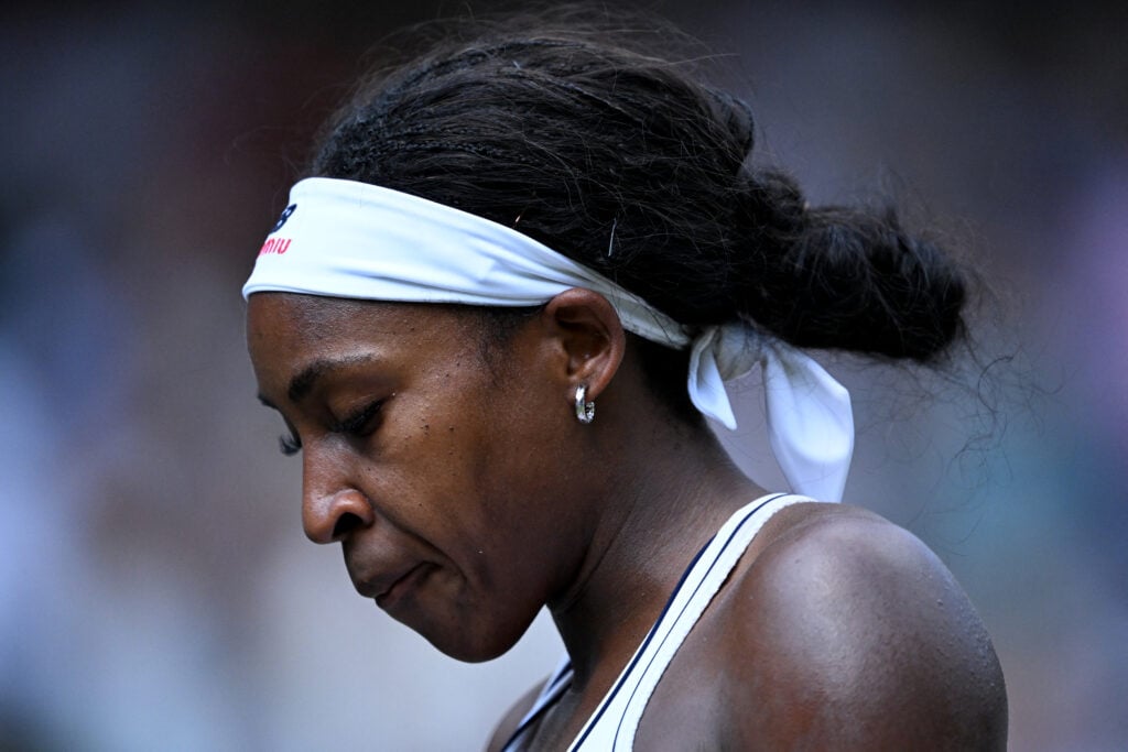 Coco Gauff looks dejected after losing to Karolina Muchova in the 2026 Wimbledon semi-finals.