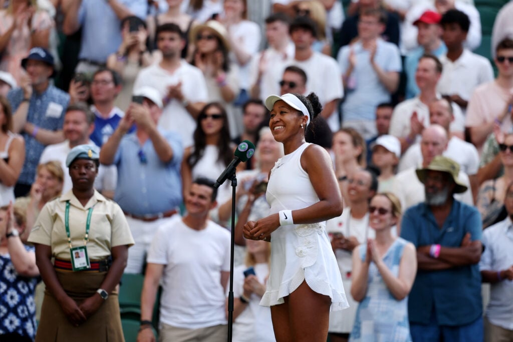 Naomi Osaka of Japan is interviewed on court after victory against Aryna Sabalenka during their Ladies' Singles fourth round match on day seven of The Championships Wimbledon 2026 at All England Lawn Tennis and Croquet Club on July 05, 2026 in London, England.