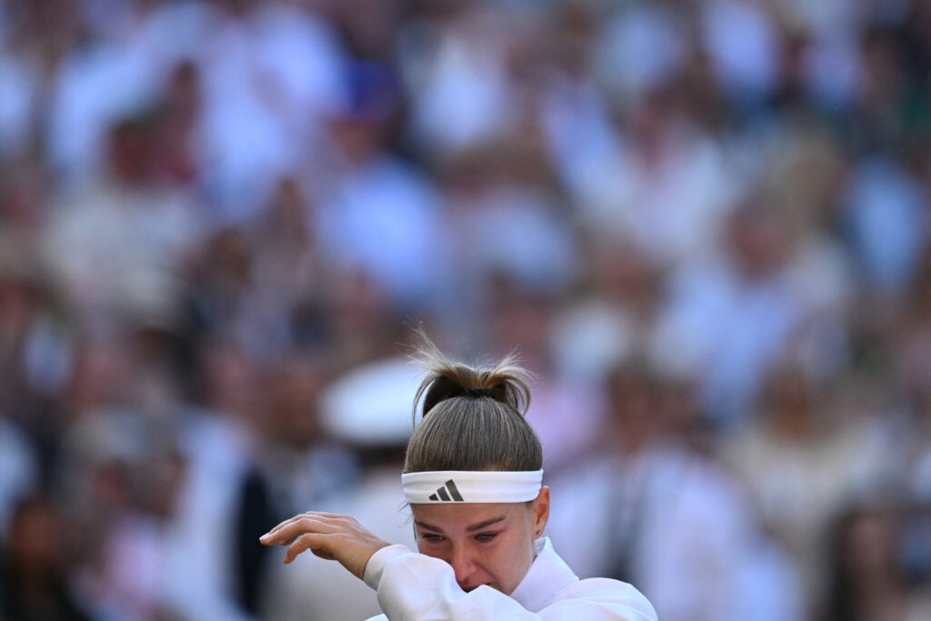 Czech Republic's Karolina Muchova reacts following her defeat against Czech Republic's Linda Noskova at the end of their women's singles final tennis match on the thirteenth day of the 2026 Wimbledon Championships at The All England Lawn Tennis and Croquet Club in Wimbledon, southwest London, on July 11, 2026.