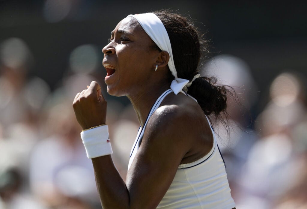 Coco Gauff celebrates winning her quarter-final match at Wimbledon.