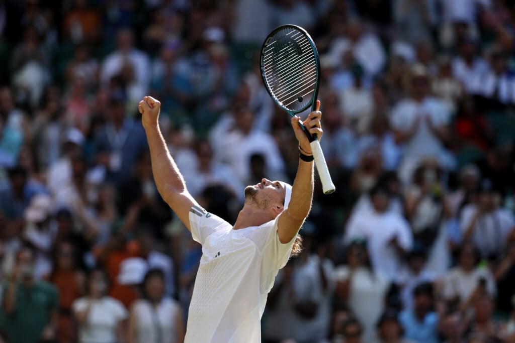 Alexander Zverev celebrates after reaching the Wimbledon quarter-finals.