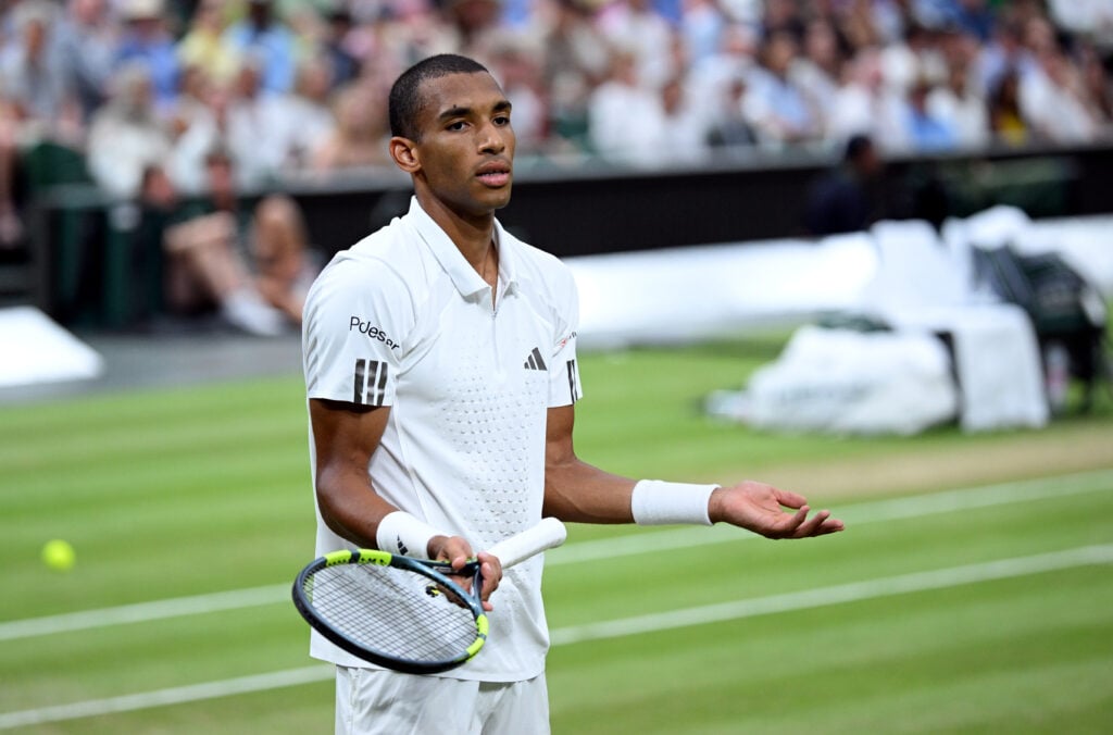 Felix Auger-Aliassime reacts during his quarter-final defeat to Wimbledon.