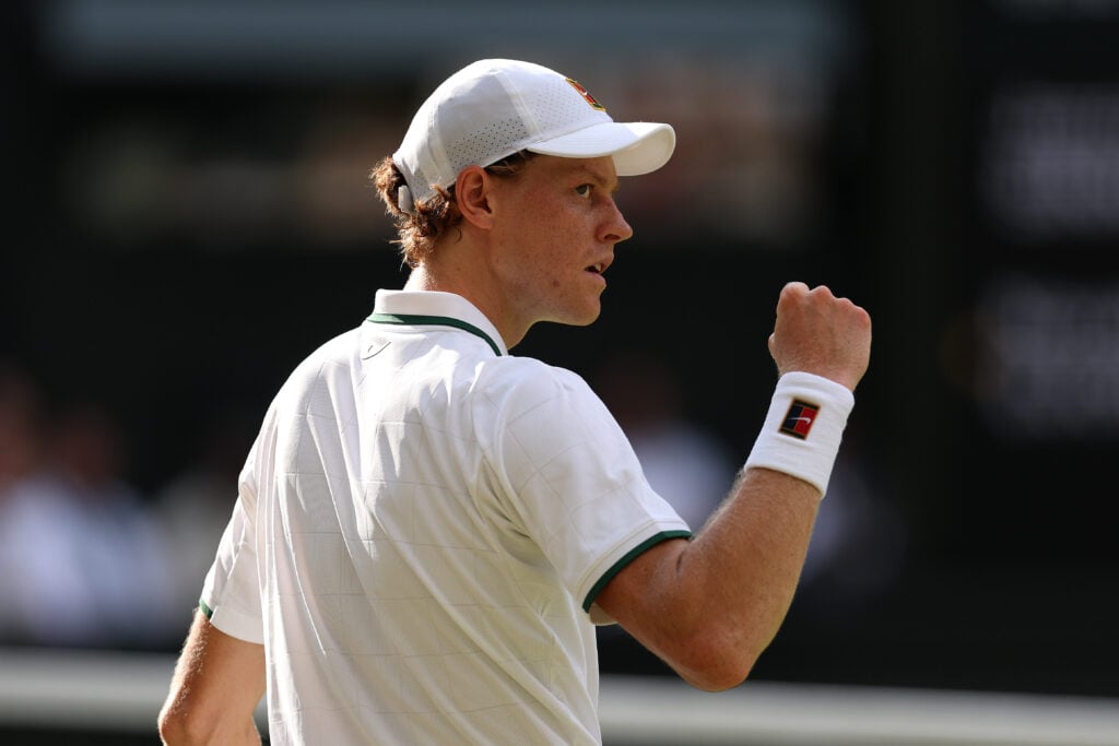Jannik Sinner reacts during his match against Novak Djokovic at Wimbledon in 2026.