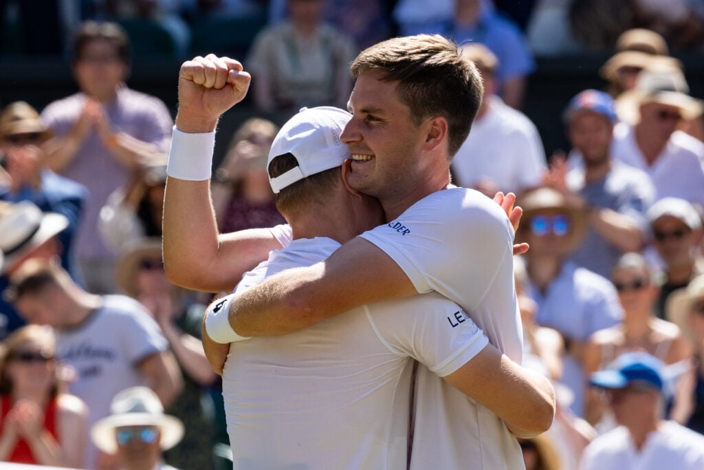 Henry Patten and Harri Heliovaara celebrate winning Wimbledon doubles title in 2026.