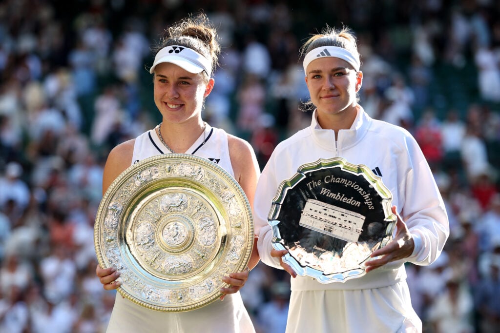 Linda Noskova and Karolina Muchova pose with their respective trophies after the 2026 Wimbledon final.