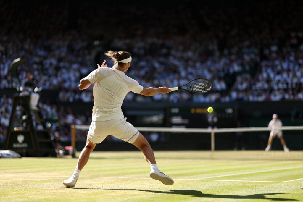 Alexander Zverev hits a forehand during the 2026 Wimbledon final.