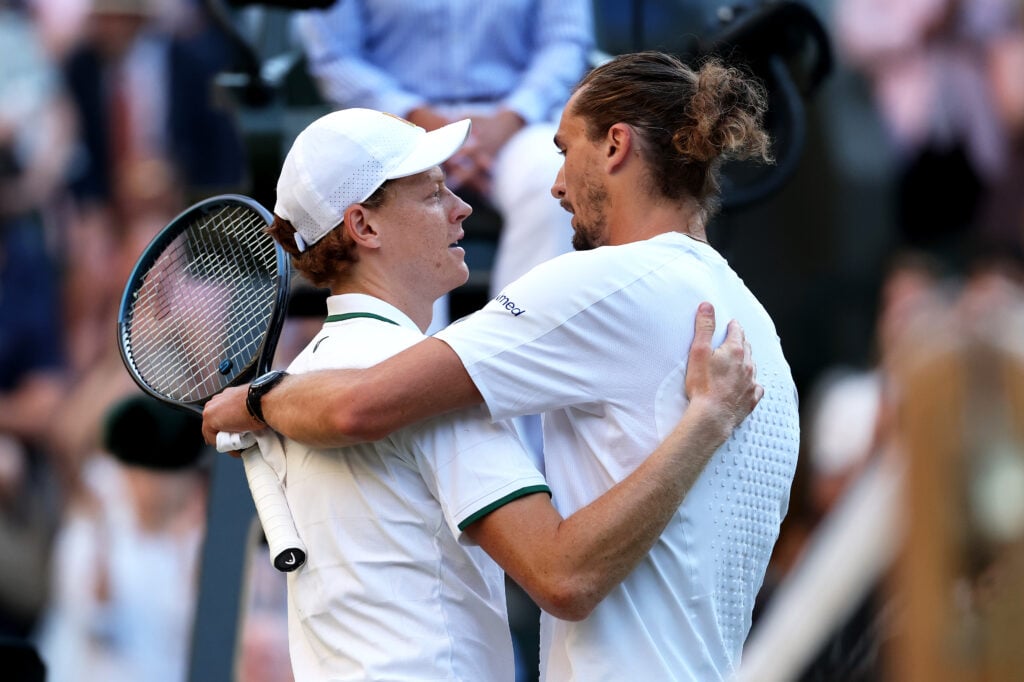 Jannik Sinner of Italy and Alexander Zverev of Germany embrace at the net after their Gentlemen's Singles final match on day fourteen of The Championships Wimbledon 2026 at All England Lawn Tennis and Croquet Club on July 12, 2026 in London, England.