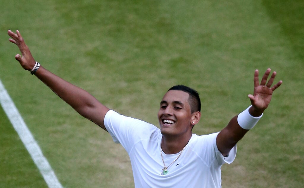 Australia's Nick Kyrgios celebrates winning his men's singles fourth round match against Spain's Rafael Nadal on day eight of the 2014 Wimbledon Championships at The All England Tennis Club in Wimbledon, southwest London, on July 1, 2014. Kyrgios won 7-6, 5-7, 7-6, 6-3.