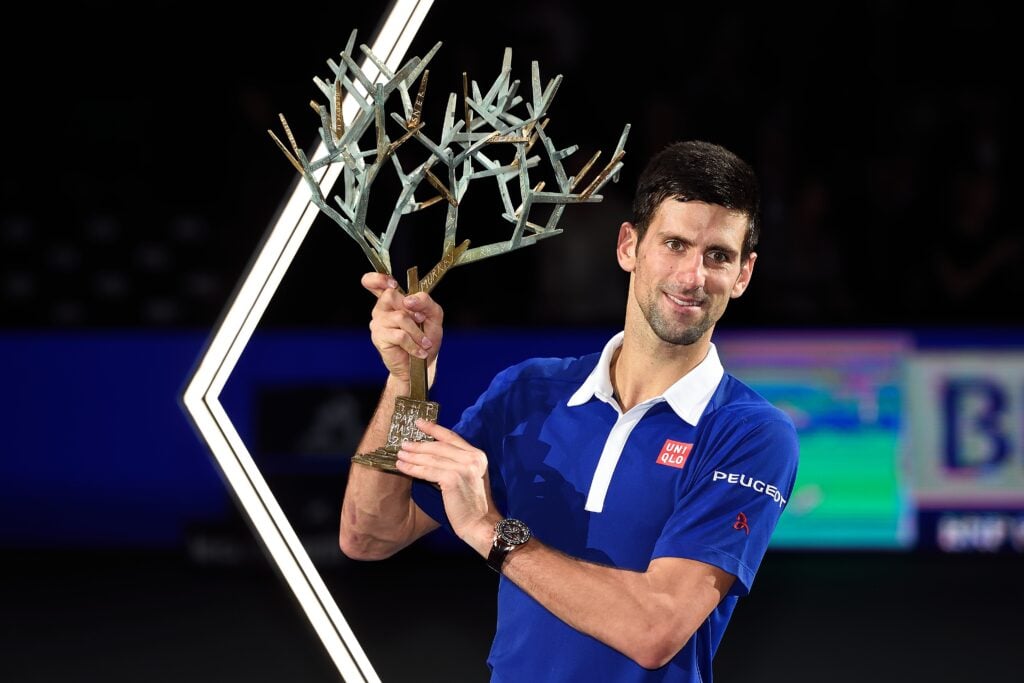 Novak Djokovic celebrates after winning the 2015 Paris Masters.
