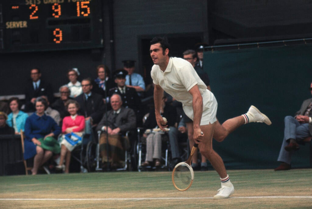 London: Great Britain's Roger Taylor in action against U.S.A.'s Clark Graebner at Wimbledon here.