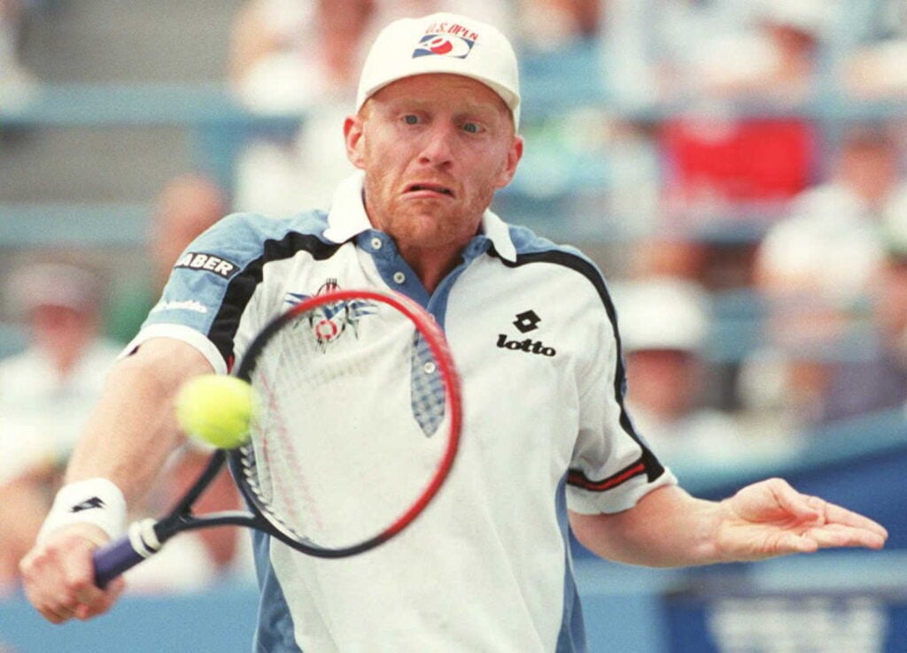 Boris Becker of Germany hits a backhand return to Jason Stoltenberg of Australia 02 September at the US Open in Flushing Meadows, New York. Becker won the match 6-2, 4-6, 6-0, 6-4.