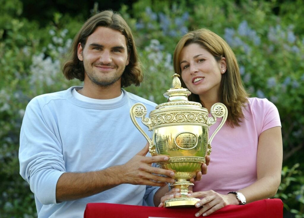 Roger and Mirka Federer with the 2003 Wimbledon Men's Singles trophy.