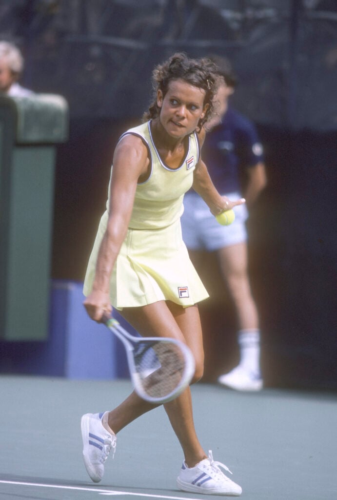 Evonne Goolagong of Australia returns a shot during a match at the Women's 1979 US Open Tennis Championships circa 1979 at National Tennis Center in the Queens borough of New York City.