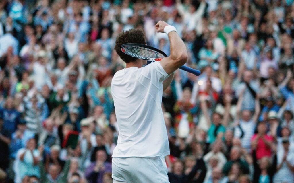 Andy Murray of Great Britain celebrates winning the men's singles round four match against Richard Gasquet of France on day seven of the Wimbledon Lawn Tennis Championships at the All England Lawn Tennis and Croquet Club on June 30, 2008 in London, England.