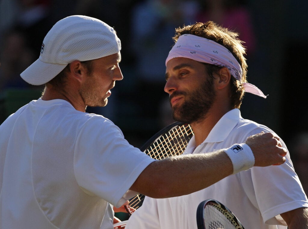 Rainer Schuttler and Arnaud Clement pictured after their Wimbledon quarter-final in 2008.