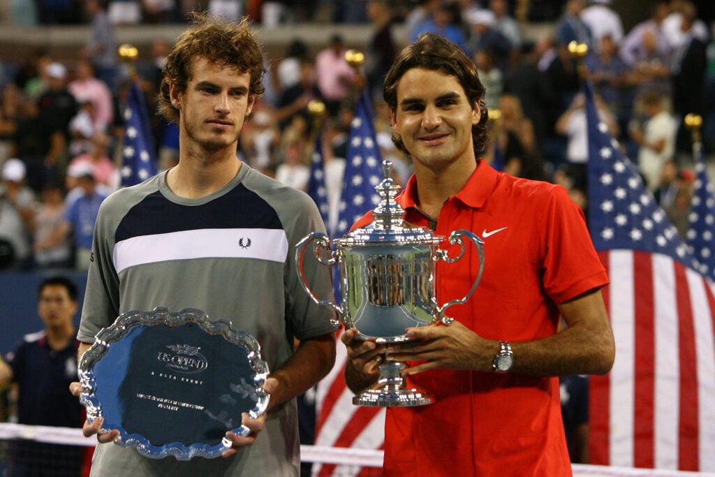 Roger Federer of Switzerland and Andy Murray of the United Kingdom pose with their trophies after the 2008 U.S. Open Men's Championship Match in Arthur Ashe Stadium at the USTA Billie Jean King National Tennis Center on September 8, 2008 in the Flushing neighborhood of the Queens borough of New York City.