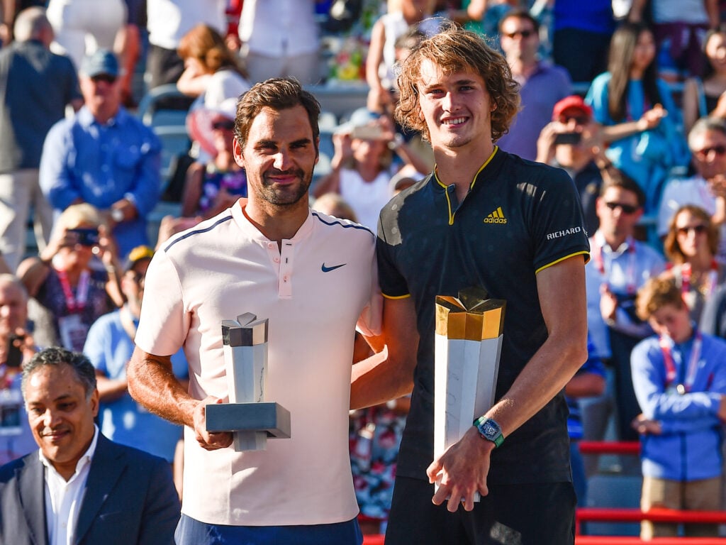 Alexander Zverev of Germany poses with Roger Federer of Switzerland after defeating him 6-3, 6-4 in the final during day ten of the Rogers Cup presented by National Bank at Uniprix Stadium on August 13, 2017 in Montreal, Quebec, Canada.