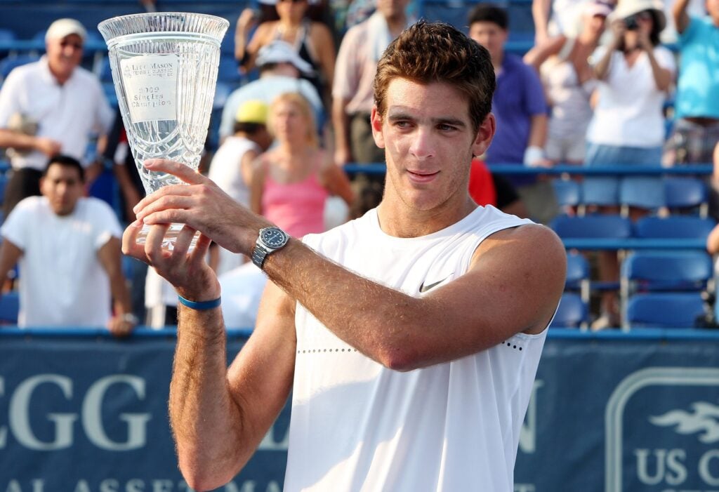 Juan Martin Del Potro of Argentina celebrates with his trophy after defeating Andy Roddick during Day 7 of the Legg Mason Tennis Classic at the William H.G. FitzGerald Tennis Center on August 9, 2009 in Washington, DC. Del Potro won the championship 3-6,7-5,7-6.