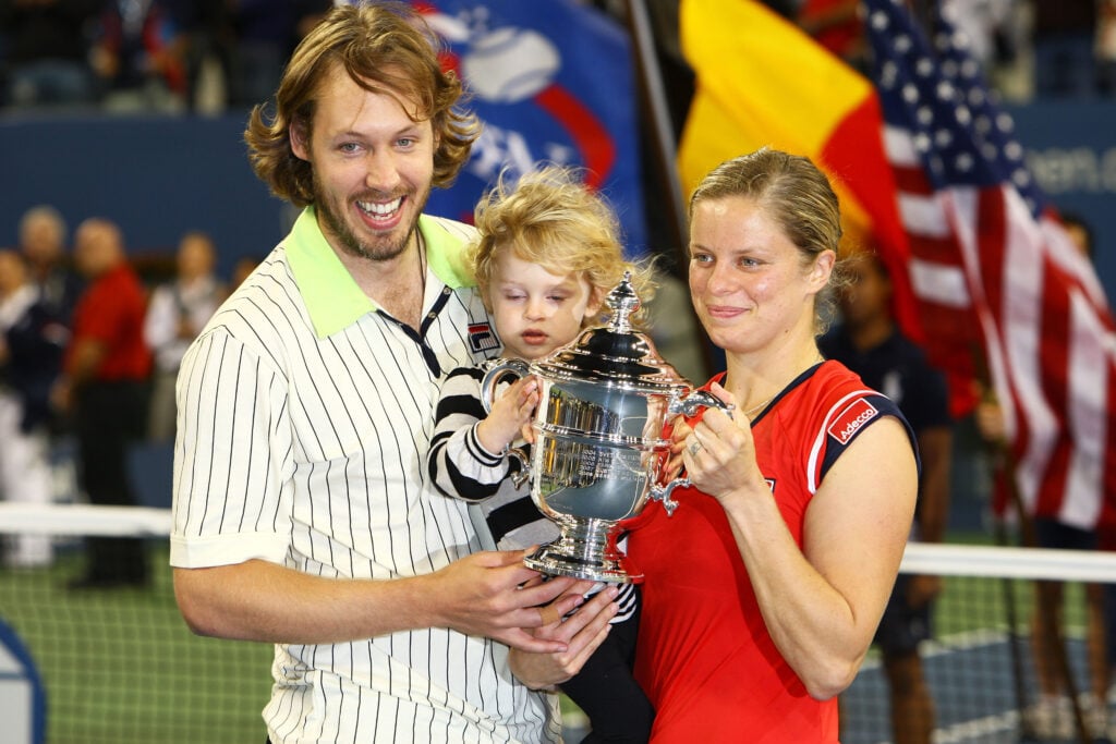 Kim Clijsters of Belgium poses with the championship trophy alongside husband Brian Lynch and daughter Jada after defeating Caroline Wozniacki of Denmark in the Women�s Singles final on day fourteen of the 2009 U.S. Open at the USTA Billie Jean King National Tennis Center on September 13, 2009 in the Flushing neighborhood of the Queens borough of New York City. Clijsters defeated Wozniacki 7-5, 6-3.