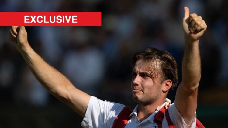 Arthur Fery acknowledges the centre court crowd after winning his quarter-final match against Flavio Cobolli on day ten of The Championships Wimble...